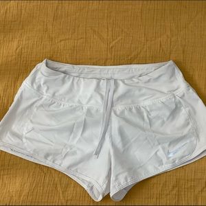 White Nike shorts
